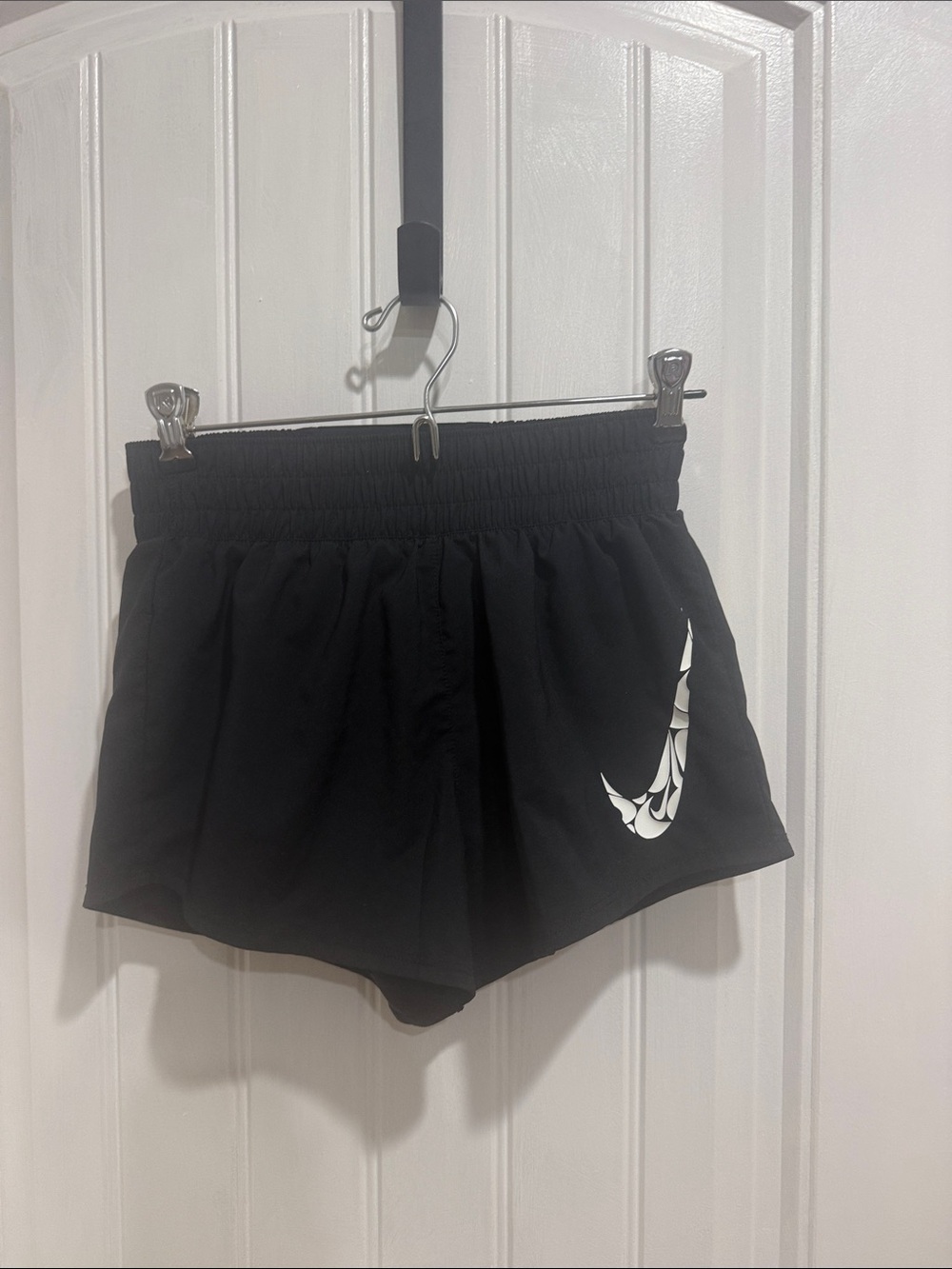 Nike Black Women's Athletic Shorts with White Swoosh Accent